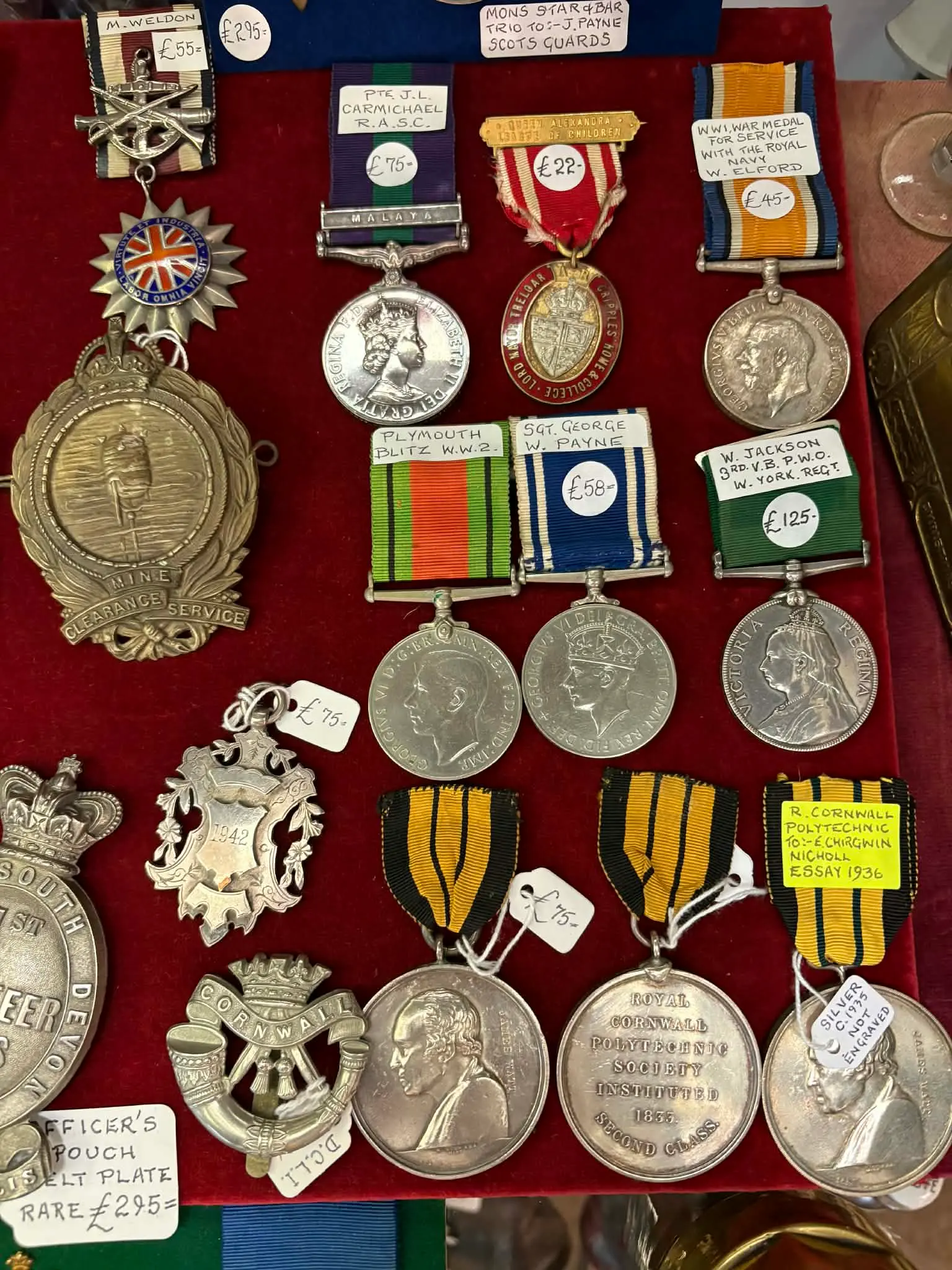 Military medals and badges in cabinet